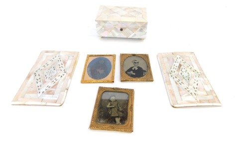 A Victorian mother of pearl rectangular box, two mother of pearl inlaid book covers, one engraved Jerusalem, and three daguerreotype portraits. (a quantity) Auctioneer Announce: The mother of pearl box no longer has its ball feet in the illustration.