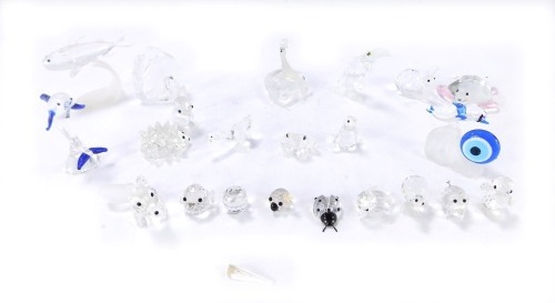 A group of Swarovski and other crystal ornaments, to include a dolphin, squirrel, pelican, hedgehog, frog, snail, tortoise, etc. (AF) (a quantity)