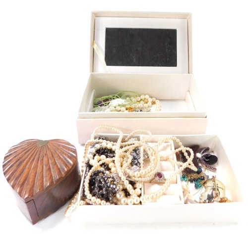 Two jewellery boxes and contents, comprising brooches, faux pearl necklaces, dress rings, etc. (a quantity)