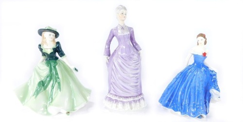 Three porcelain figures, comprising Royal Worcester Holly, 17cm high, Coalport Sarah, 22cm high, and Royal Worcester Isabel, 17cm high. (3)