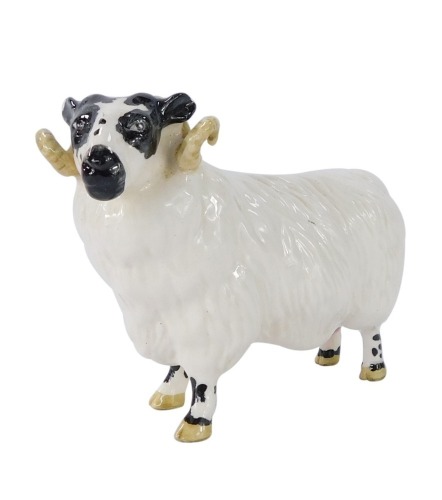 A Beswick pottery figure of a ram, 8cm high.
