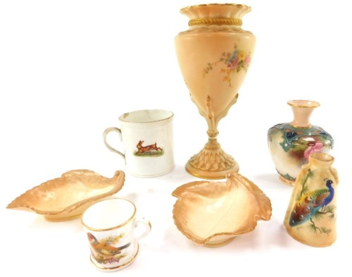 A group of 19thC and later ceramics, comprising a Royal Worcester vase, 9cm high, a Shelley painted Zoo mug, 7cm high, two blush ivory Royal Worcester pin dishes, 11cm wide, loving cup, blush ivory Worcester peacock jug, 7cm high, and a blush ivory trumpe