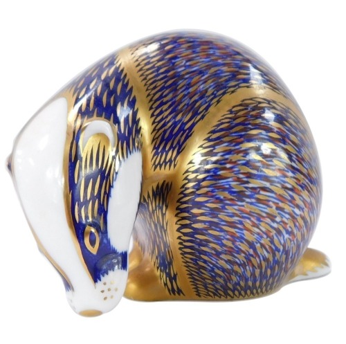 A Royal Crown Derby badger paperweight, with gold stopper, 8cm high, boxed.