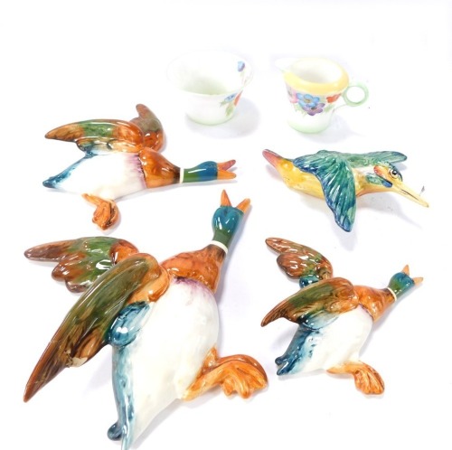 A set of three graduated Beswick wall mounted Mallard ducks, together with a wall mounted kingfisher, the largest duck 20cm wide, the kingfisher 12cm wide, and a Shelley porcelain sugar bowl and milk jug. (6, AF)