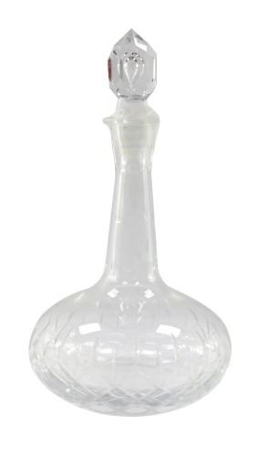 A cut glass globe and shaft decanter, with a faceted stopper, 30cm high.