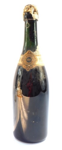 A bottle of Pol Roger Champagne Brut, dated 1934.