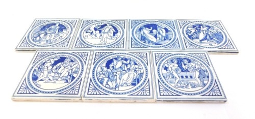 Seven Mintons blue and white John Moyr Smith design wall tiles, comprising Shakespeare's Henry IV part I, Anthony and Cleopatra, The Taming Of The Shrew, Romeo & Juliet, The Tempest, Winters Tale and Macbeth, 15cm x 15cm.