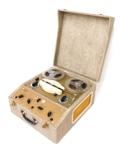 A Brenall reel to reel tape player, cased, 23cm high, 43cm wide, 45cm deep.