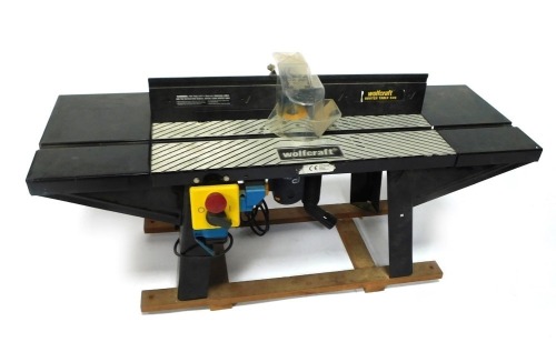 A Wolfcraft Pro router, 1/2", 240v, 45cm high, 104cm wide, 36cm deep.