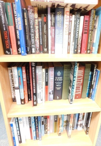 A group of war related books, comprising Technical Innovations manual, Aircraft Carrier manuals, Defence of the Realm, The Blitz, Third Reich, Battle of the Atlantic, etc. (3 shelves)