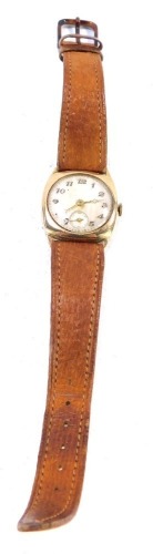 A 9ct gold cased gentleman's wristwatch, the square set dial with silvered numeric dial and seconds counter, 2cm wide, on a tan leather strap, 18.3g all in.