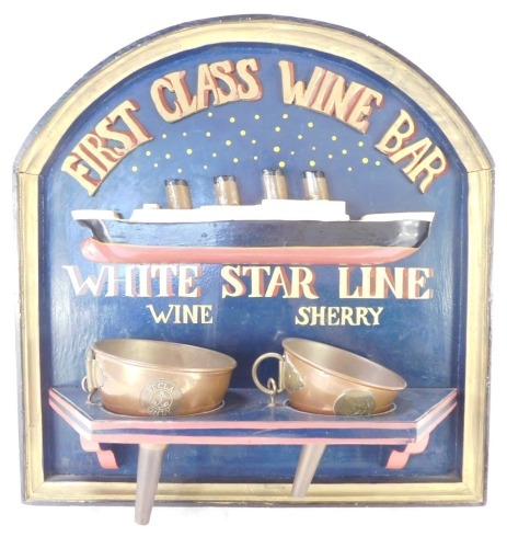 A White Star Line First Class Wine Bar sign, painted on a royal blue ground, with brass first class gallon funnels, 34cm high, 35cm wide.
