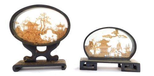 Two 19thC framed cork display cases, comprising one square set with tower, 13cm high, the other of typical buildings and trees, 13cm high. (2)