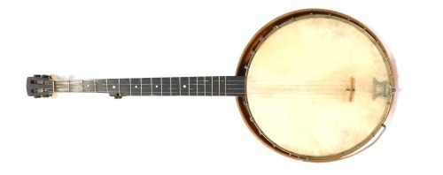 A banjo, with light wood case, on mahogany stem, silvered dials, in travel case. (AF)