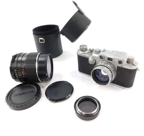 A Leica Ernst Leitz Wetzler camera, and a Mamiya 55mm lens. (2)