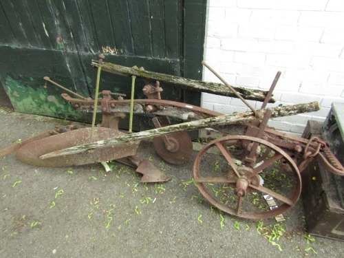 An agricultural plough (AF).