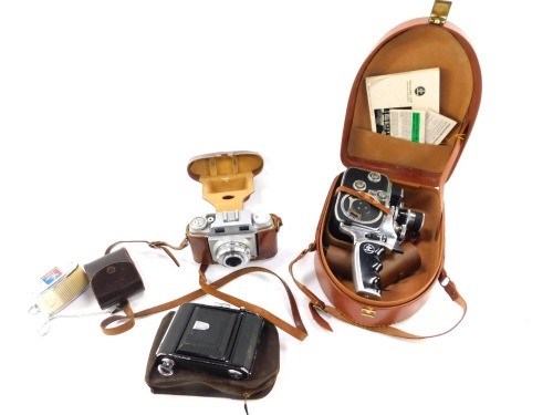 A Bolex Paliard cine camera, an Agfa Super Selet Prontour SVS camera, and a Zeiss Ikon box camera. (4)