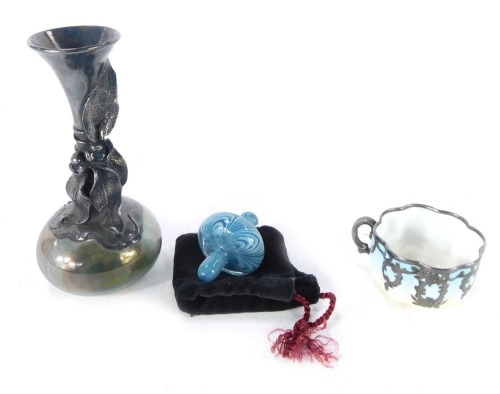 A late 19thC Hollohaza Hungarian glass vase, of long necked form, overlaid in white metal with a decoration of bound flowers and leaves, etched mark, 13cm high, a German late 19thC fluted glass coffee cup, with silver overlay, shield reserve engraved and 