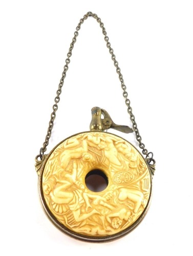 A Denix replica of a German 17thC powder flask, of bi-disc form, moulded with naked figures, on a chain suspension, 12.5cm wide.