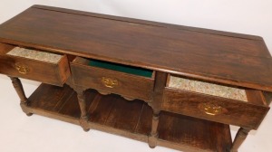 An oak dresser in 18thC style, with arrangement of three drawers with fret gallery base, on bun feet, 74cm high, 158cm wide, 52cm deep. - 2