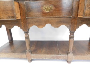 An oak dresser in 18thC style, with arrangement of three drawers with fret gallery base, on bun feet, 74cm high, 158cm wide, 52cm deep. - 3