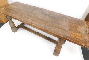 An oak refectory table, with planked top on H frame base, 76cm high, 231cm wide, 74cm deep. - 2