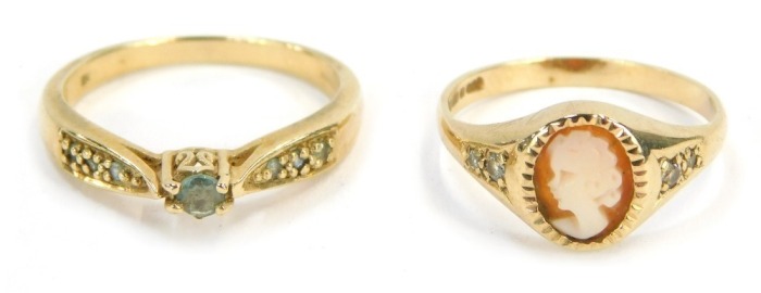 Two 9ct gold dress rings, comprising a cameo and CZ dress ring, ring size L&frac12;, and an aquamarine and CZ dress ring, ring size O, 4g all in. (2)