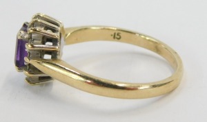 Two 9ct gold cluster rings, one set with amethyst and CZ on a raised basket setting, ring size O&frac12;, and a three layer floral cluster, ring size N, 4.9g all in. (2) - 3