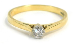 An 18ct gold diamond solitaire ring, with round brilliant cut diamond in claw setting, approx 0.10cts, on a pierced shank, ring size P&frac12;, 2.8g all in.