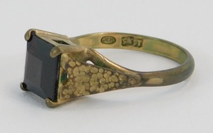 A dress ring, set with square cut garnet on bark effect shoulders in claw setting, ring size M&frac12;, yellow metal, stamped 9ct, 3.3g all in. - 2