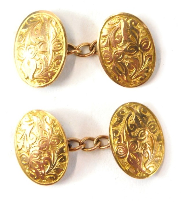 A pair of 9ct gold oval cufflinks, each with engraved decoration on curb link, 4.4g.