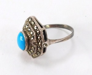 A silver, marcasite and turquoise set dress ring, in the Art Deco style with central turquoise on two outer fanned marcasite set border, ring size O, 5.2g all in. - 2