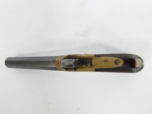 A 19thC box lock percussion pistol, with retractable trigger, octagonal steel barrel, brass lock, and walnut handle, 20cm. - 5