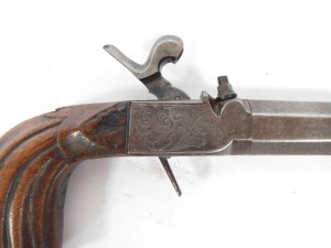 An early 19thC box lock percussion pocket pistol with detachable part turned and octagonal twist barrel, engraved lock, concealed trigger and carved walnut handle, 23cm. - 3