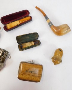A brass sovereign and half sovereign case, cheroot holders, coquilla nut thimble case, purse, etc. - 3