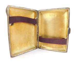 A George V silver cigarette case, with engraved borders and monograms, Birmingham 1917, another similar and a vesta case. (3) - 2