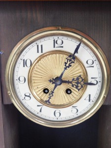 An early 20thC walnut mantel clock, with Vienna style fret moulded horse top, brass and ceramic numeric dial, 72cm high, 31cm wide, 15cm deep. - 3