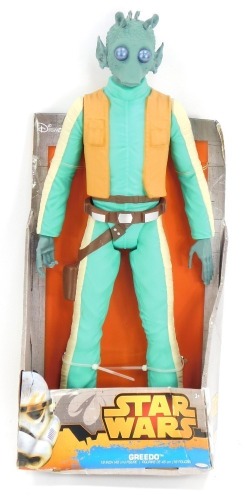 A Star Wars Greedo figure.