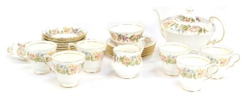 A Royal Albert Country Lane pattern part tea service, comprising teapot, milk jug, sugar bowl, cake plate, six side plates and six cups and saucers. (1 tray)