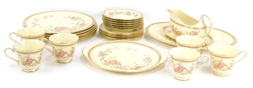 A Royal Doulton Romance Collection Lisette pattern part tea service, comprising six cups and saucers, six side plates, five dinner plates, gravy boat and saucer and a meat plate.