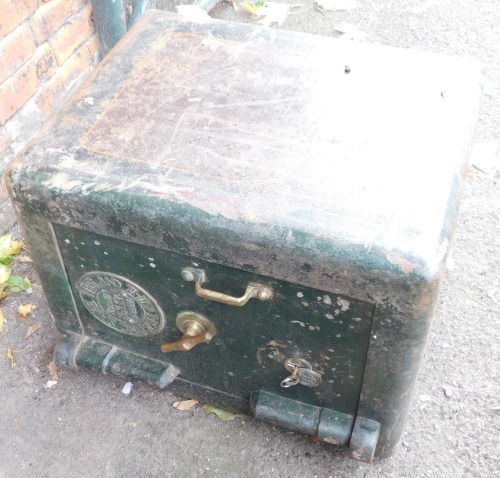 A cast iron Milners safe, 63cm high, 47cm wide, 51cm deep.