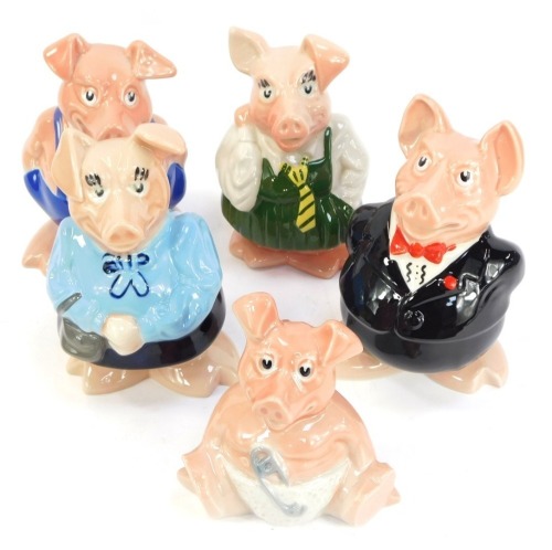 A set of five Wade Natwest piggy banks, comprising a family of father, mother, son, daughter and baby. (1 tray)