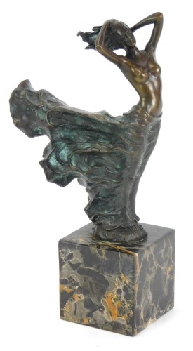 An Art Deco style bronzed figure of a lady in flowing dress, on marble base, 26cm high.