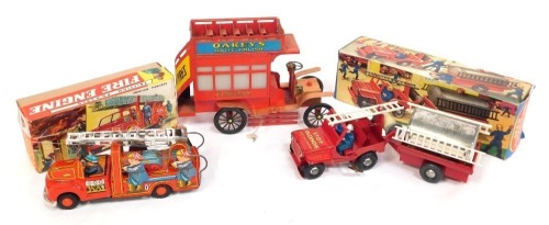 Friction powered toys, comprising fire engine, instant truck and trailer and an Oakleys knife polish, advertising bus, two boxed. (3)