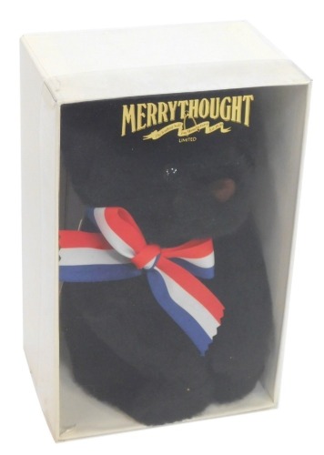 A Merrythought black collectors bear, boxed.