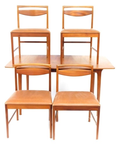 A McIntosh & Co teak extending dining table and set of four tan leather inset chairs, 72cm high, 146cm wide, 84cm deep. The upholstery in this lot does not comply with the 1988 (Fire & Fire Furnishing) Regulations, unless sold to a known exporter or uphol