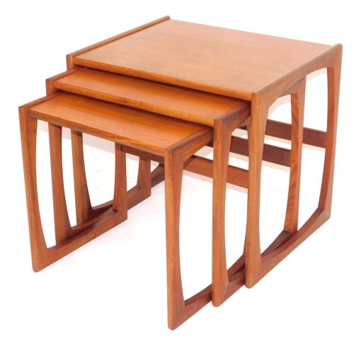 A nest of three G-Plan teak tables, the largest 49cm high, 53cm wide, 43cm deep.