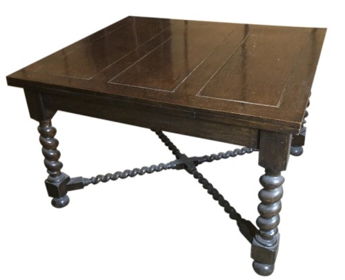 A barley twist oak draw leaf dining table, 106cm wide by 119cm minimum.